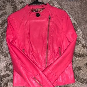 Hot pink leather jacket. A little worn to it.